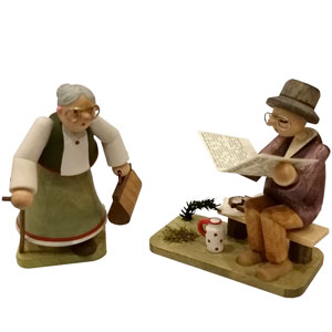 Hebamme und Zeitungsleser